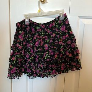 Black floral ruffled mini skirt